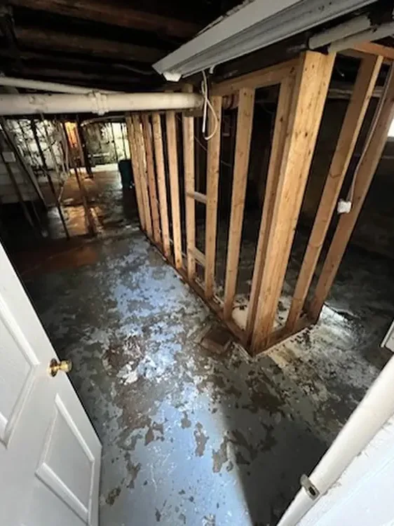 Wall studs left open to dry after floodwater was removed