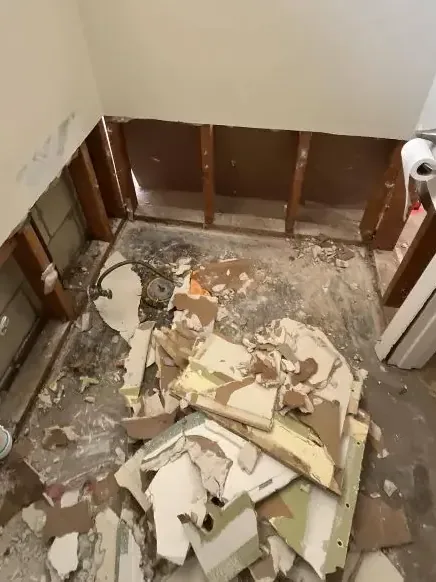 A bathroom taken down to the studs after a sewage backup