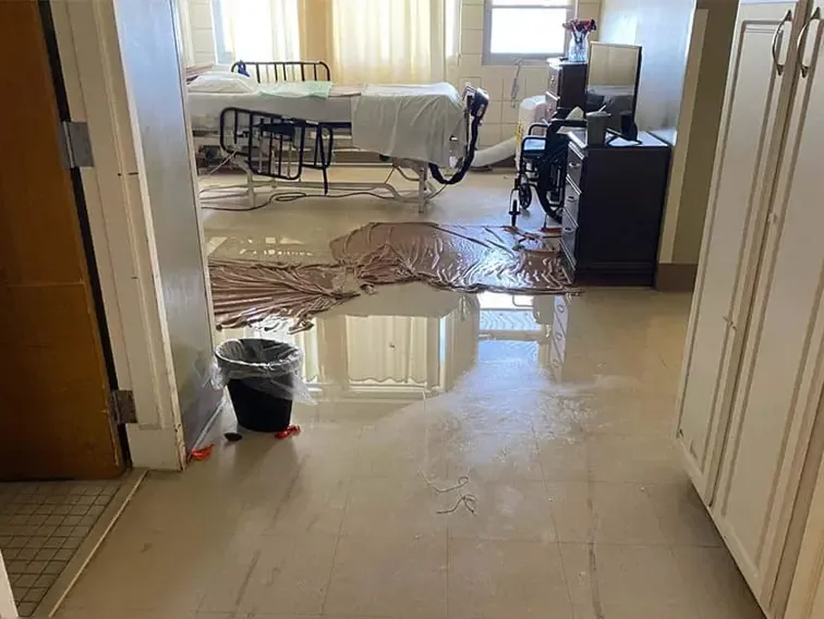 Storm water spread across the floor of a house